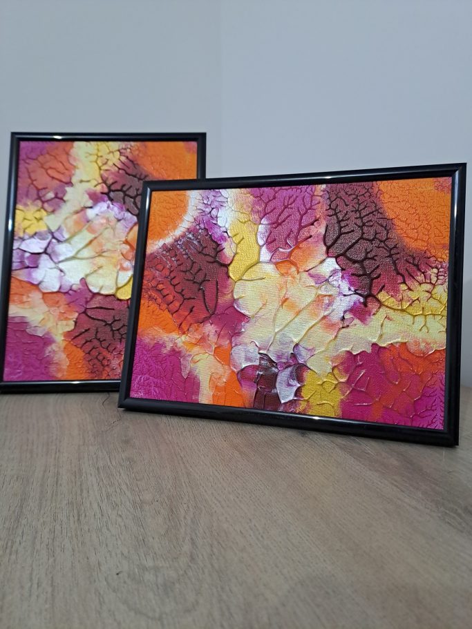 " Aurore tropicale" Deux cadres contenant des œuvres d'art colorées avec des motifs abstraits en orange et jaune.